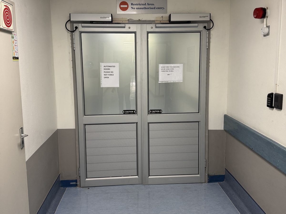 Automatic entrance with operator header and access control reader