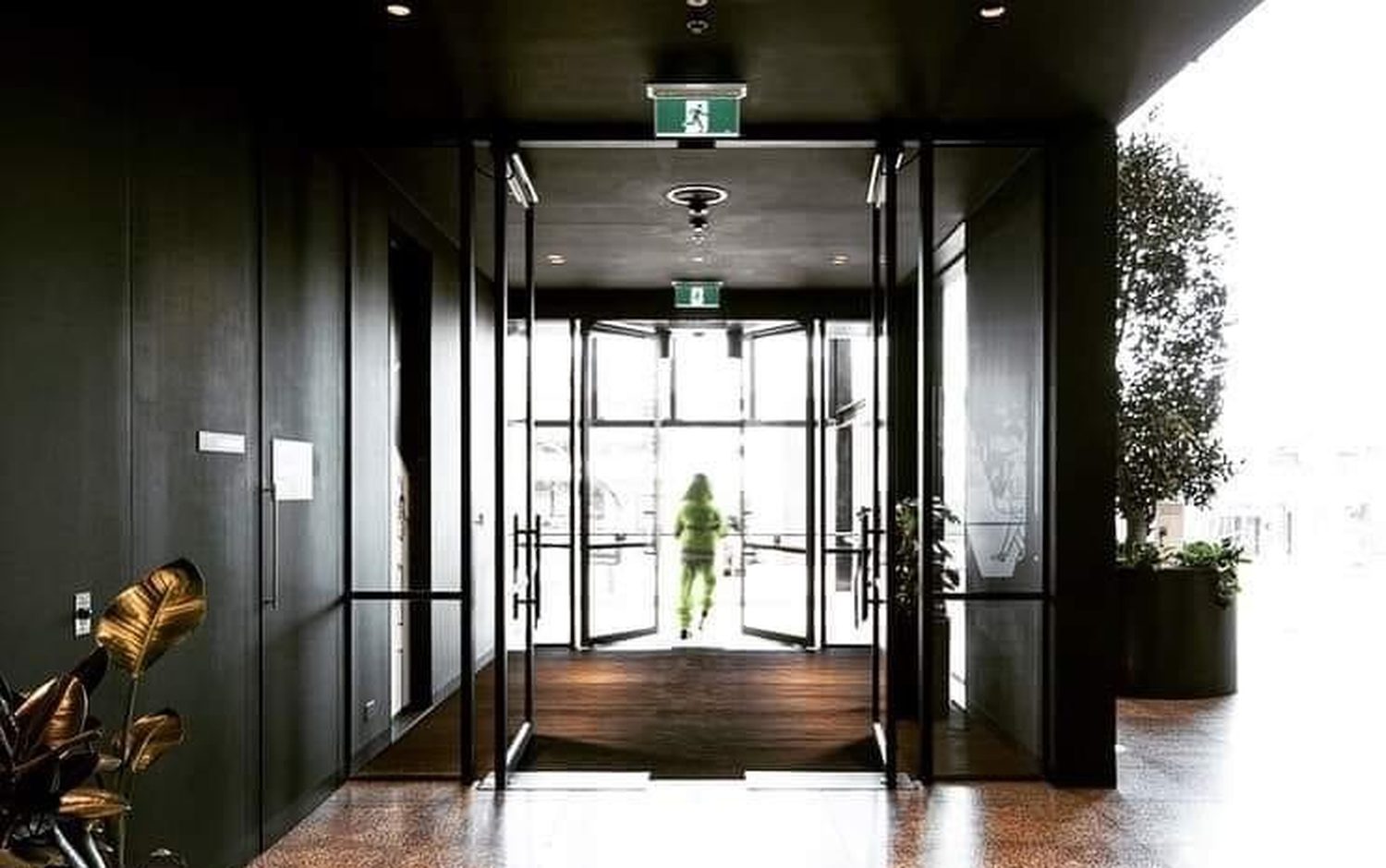 Sectors Commercial automatic doors in a hotel lobby entrance