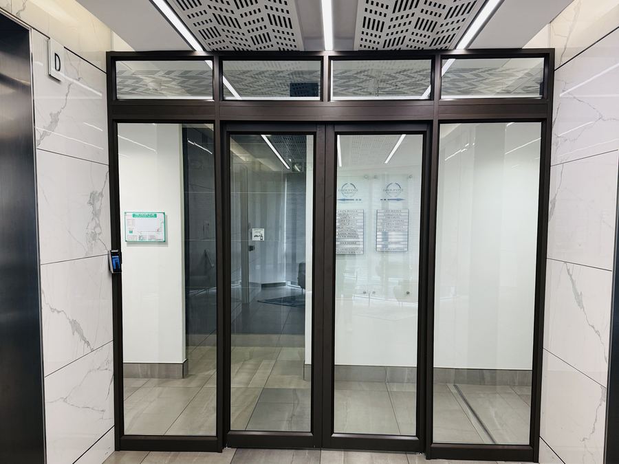 Commercial lobby entrance of the type automatic door operators Nairobi projects serve
