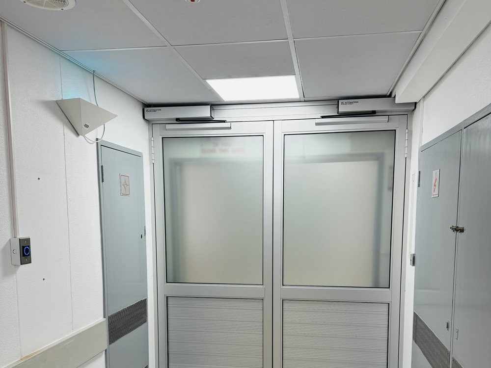 Automatic swing doors on a healthcare corridor