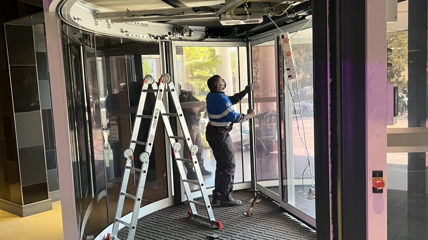 MC Automations MC Automations technician commissioning an automatic revolving door